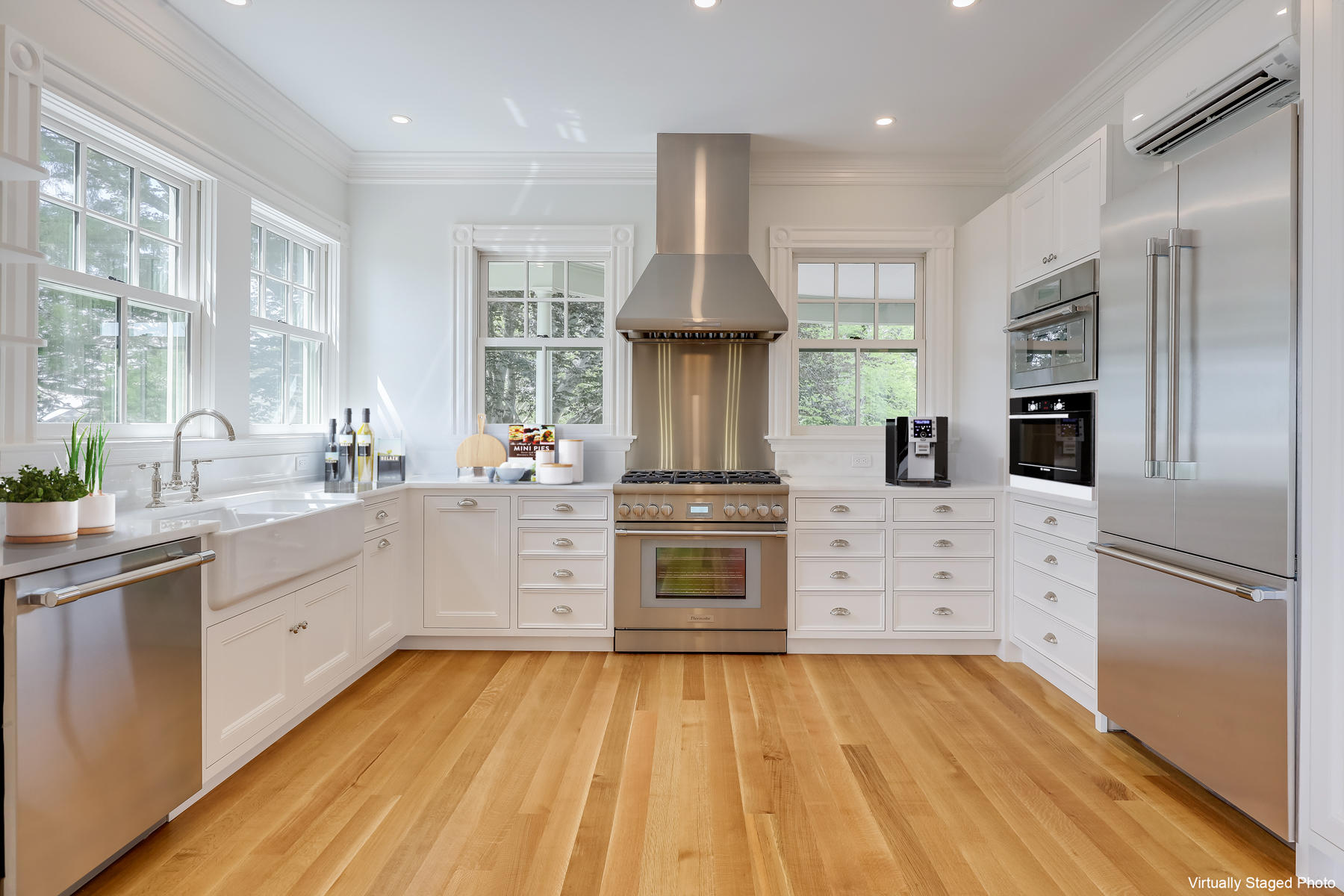 39 Juniper Point Road Woods Hole, MA 02543 - Photo 46 of 53 a kitchen with stainless steel appliances a stove refrigerator sink and cabinets