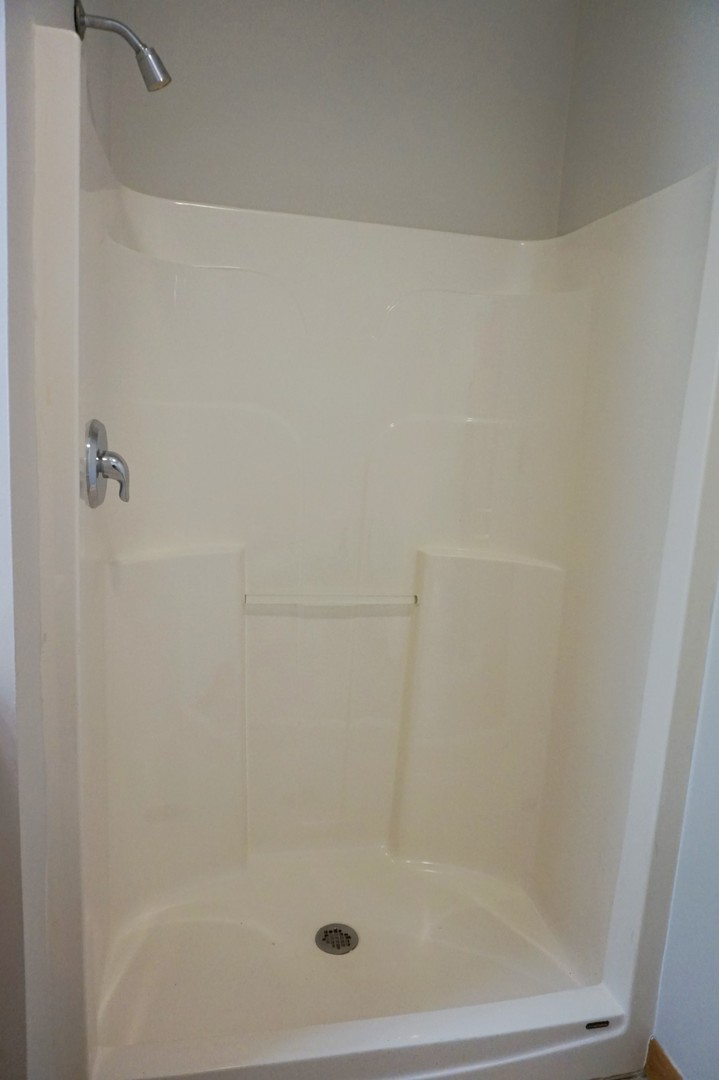 Undisclosed Address Wilmington, IL 60481 - Photo 12 of 18 a close up of a bathtub