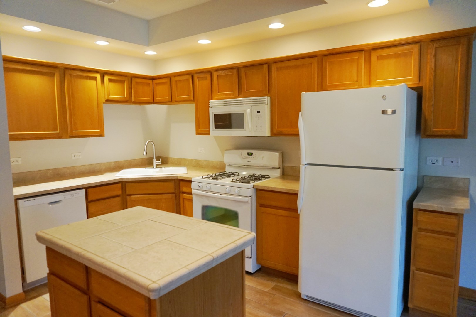 Undisclosed Address Wilmington, IL 60481 - Photo 9 of 18 a kitchen with a refrigerator sink and stove