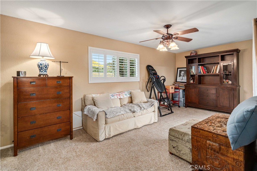 2862 Calmgarden Road Acton, CA 93510 - Photo 25 of 69 a living room with furniture and a ceiling fan