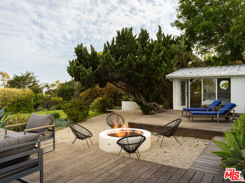 29107 Cliffside Drive Malibu, CA 90265 - Photo 18 of 22 an outdoor space with furniture