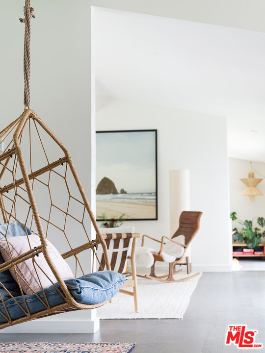29107 Cliffside Drive Malibu, CA 90265 - Photo 8 of 22 a picture of a room with a bench and white walls