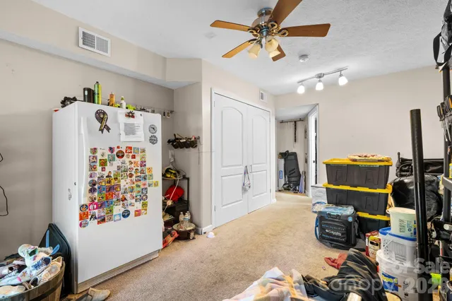 a outdoor space with a table and chairs