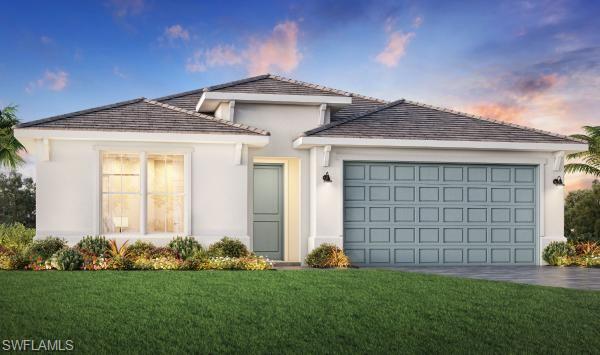 9057 Wisteria Way Naples, FL 34114 - Photo 20 of 25 a front view of a house with a garden