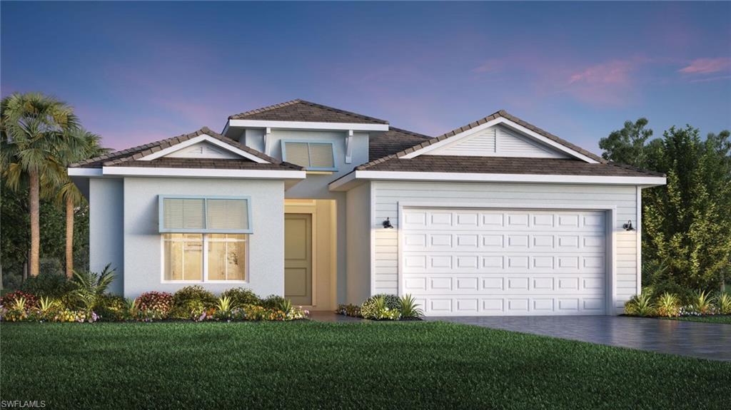 9057 Wisteria Way Naples, FL 34114 - Photo 23 of 25 a front view of a house with a garden