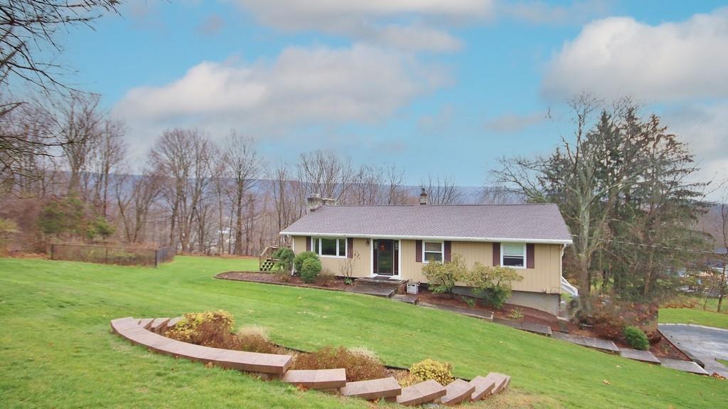 22 Helms Hill Road Washingtonville, NY 10992 - Photo 1 of 1 a front view of a house with garden and porch