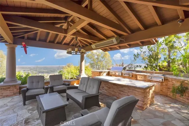 a view of an entryway with wooden floor and windows