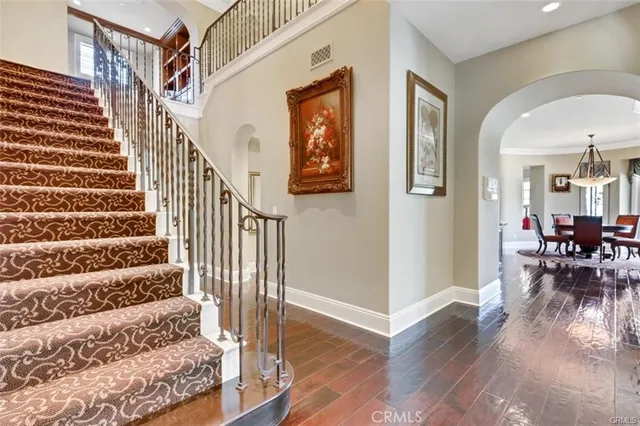 a spacious bedroom with a bed and a couch