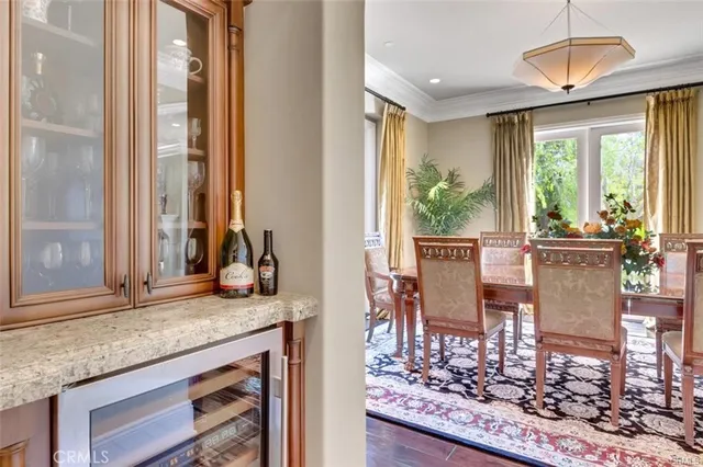 a spacious bathroom with a tub sink and mirror