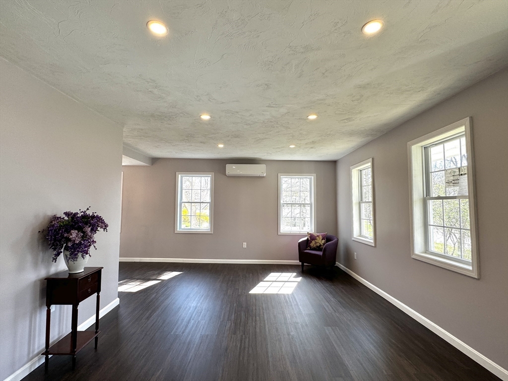 11 Main Street Brookfield, MA 01506 - Photo 16 of 29 a view of a livingroom with furniture a ceiling fan and window