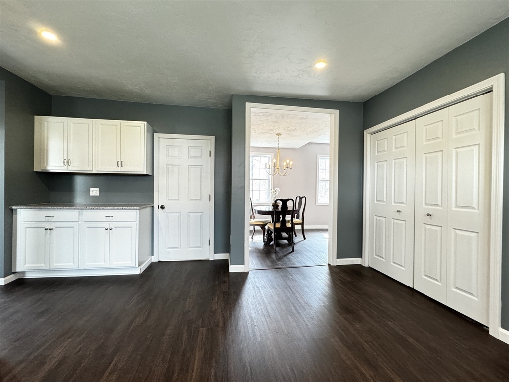 11 Main Street Brookfield, MA 01506 - Photo 8 of 29 a view of a livingroom with furniture and wooden floor