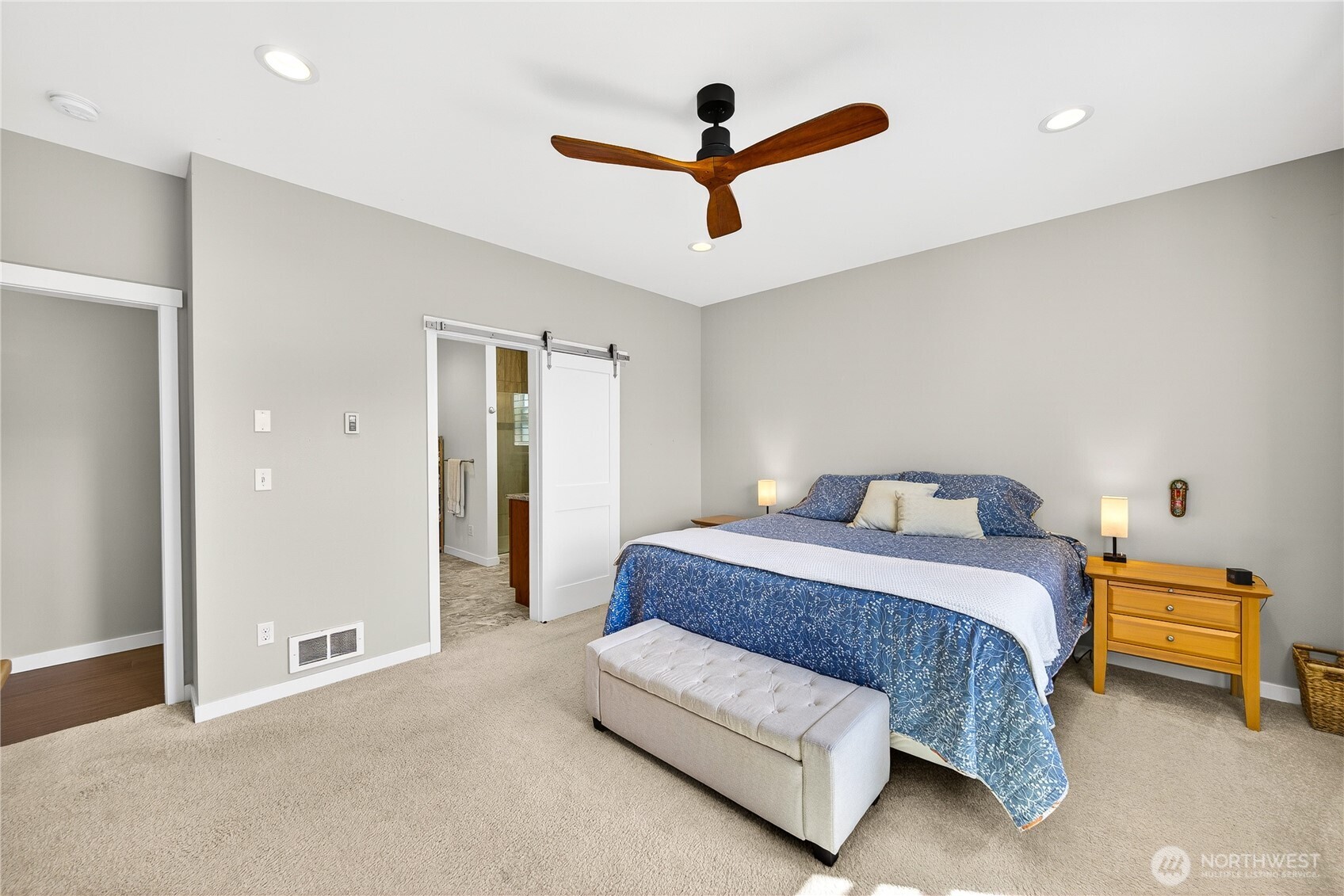 1268 Curtis Way Freeland, WA 98249 - Photo 17 of 40 a bedroom with a bed ceiling fan and a window