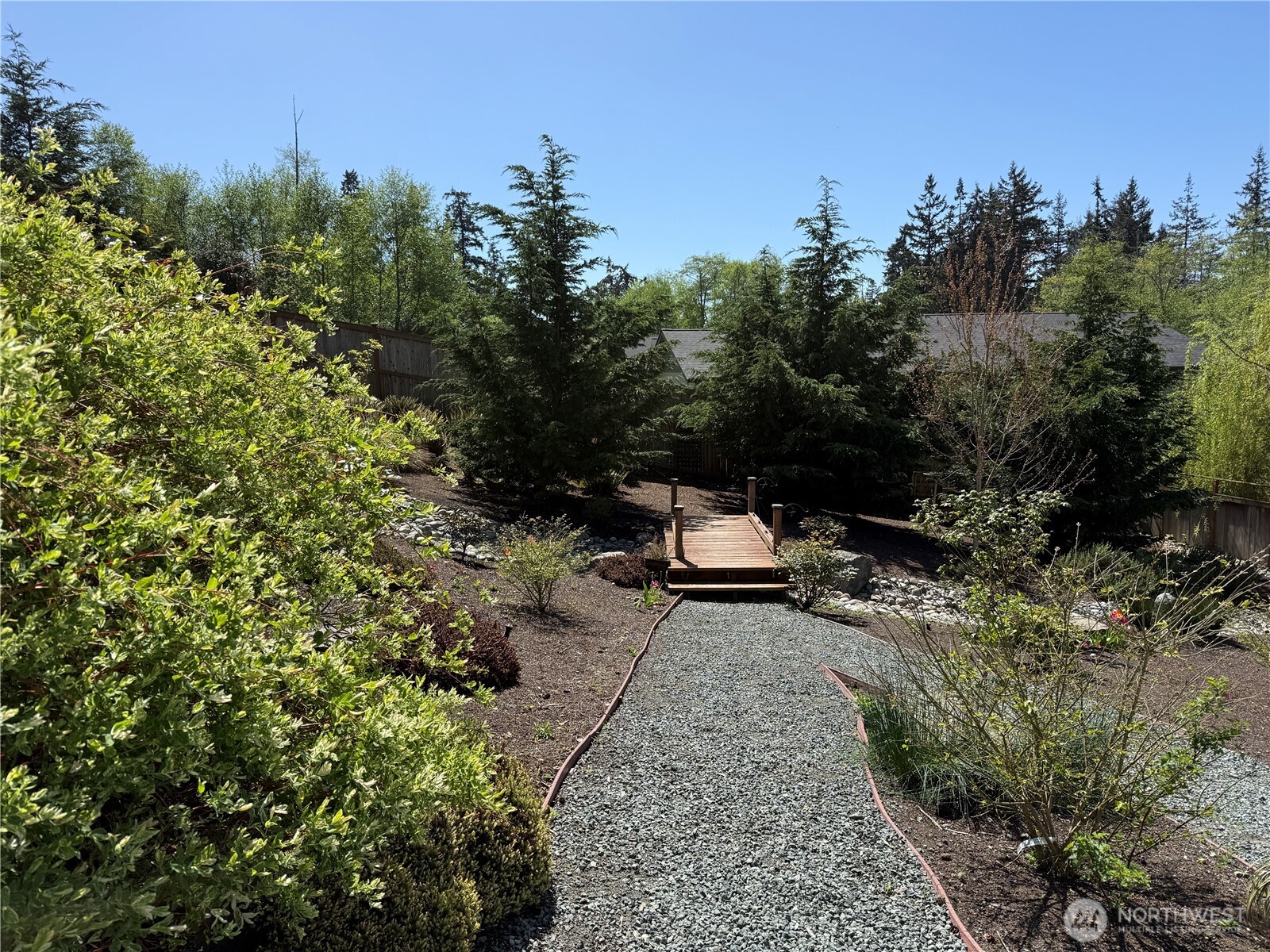 1268 Curtis Way Freeland, WA 98249 - Photo 40 of 40 a view of a backyard with sitting area