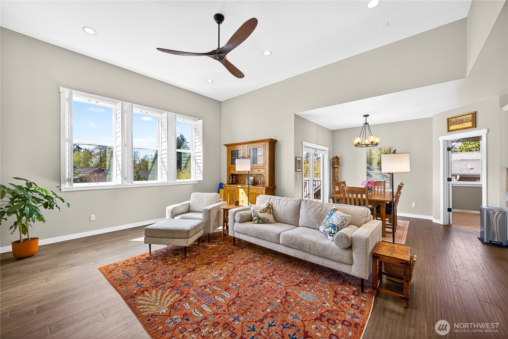 1268 Curtis Way Freeland, WA 98249 - Photo 7 of 40 a living room with furniture and wooden floor