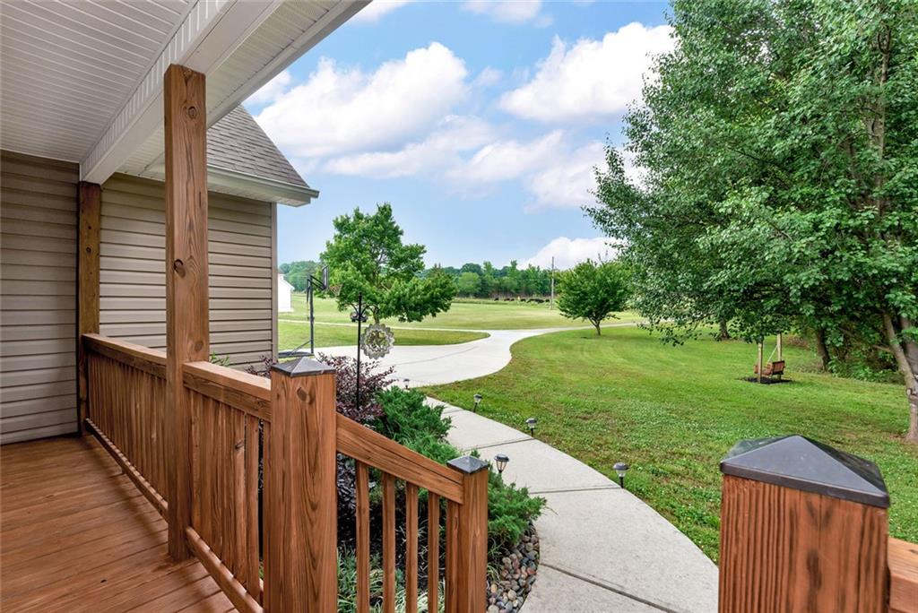 1044 Lothridge Road Cleveland, GA 30528 - Photo 5 of 40 a view of a wooden deck and a backyard