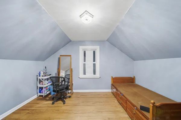 a room with furniture and a window