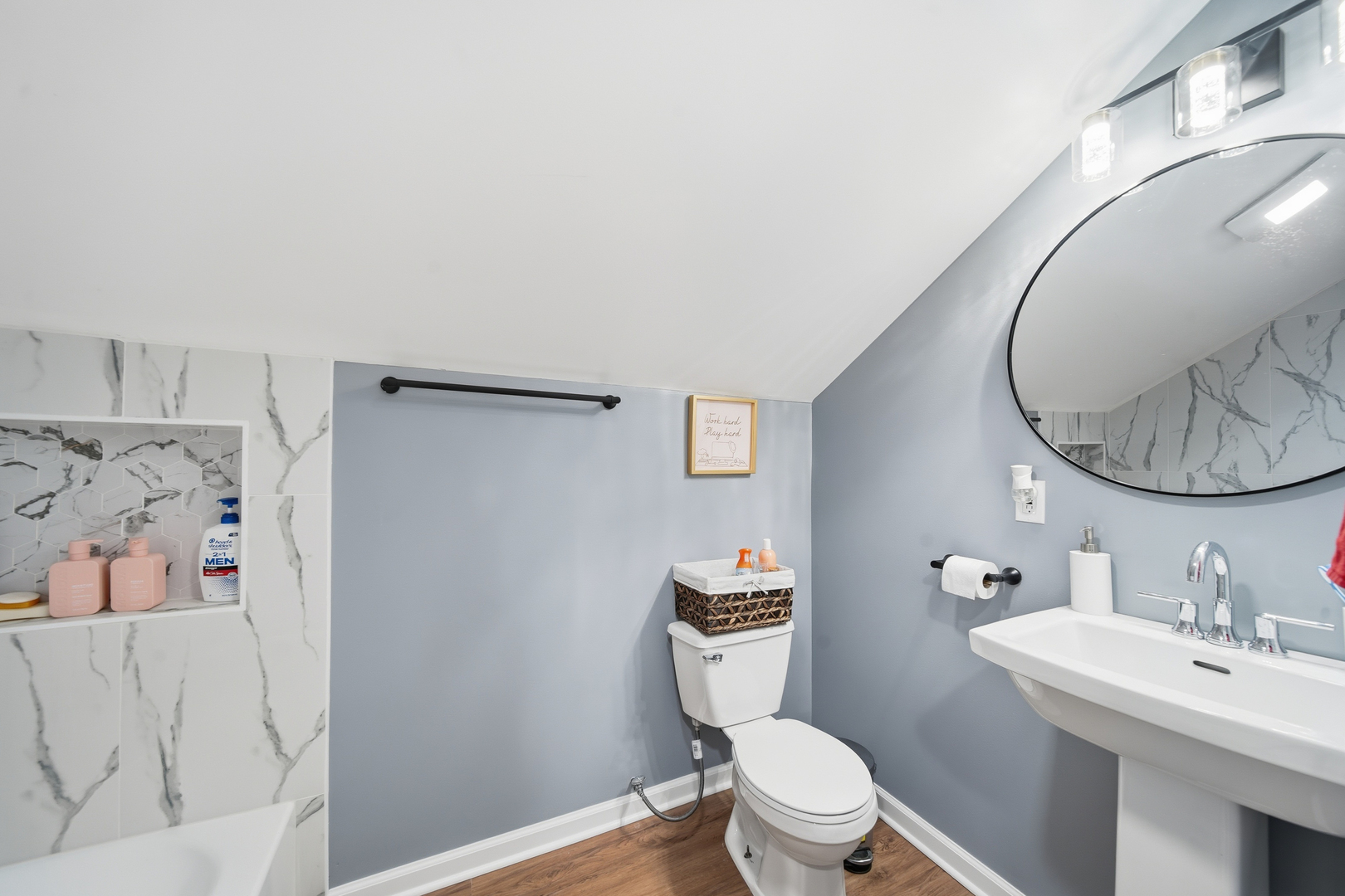 105 East Knox Street Morrison, IL 61270 - Photo 18 of 27 a bathroom with a toilet sink vanity and mirror