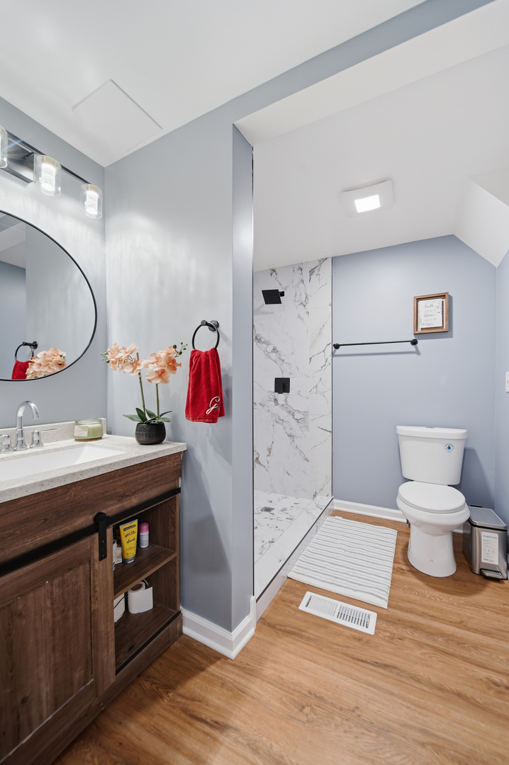 105 East Knox Street Morrison, IL 61270 - Photo 19 of 27 a bathroom with a sink and a mirror