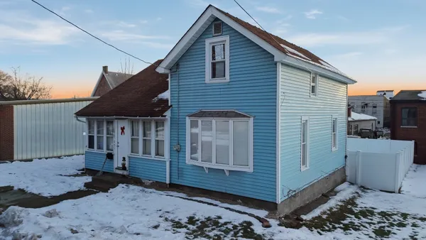 a front view of a house with a window