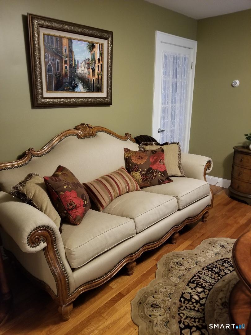 103 Windsor Street Enfield, CT 06082 - Photo 16 of 22 a living room with furniture and a couch