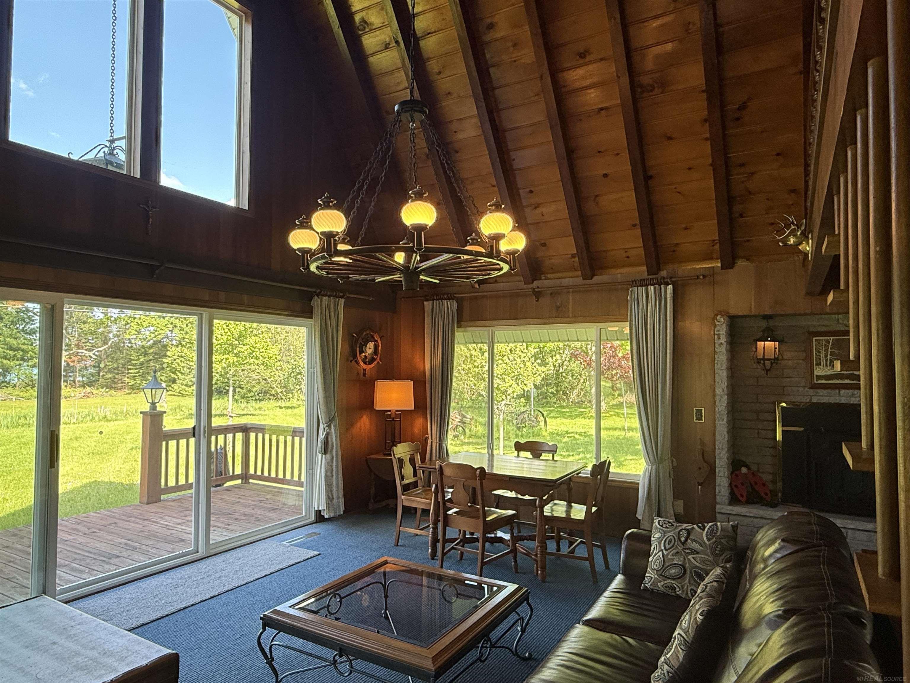2125 Mckechnie Road Harrisville, MI 48740 - Photo 20 of 61 Fills the rooms with daylight and provides un obstructed views of the lake and surrounding grounds