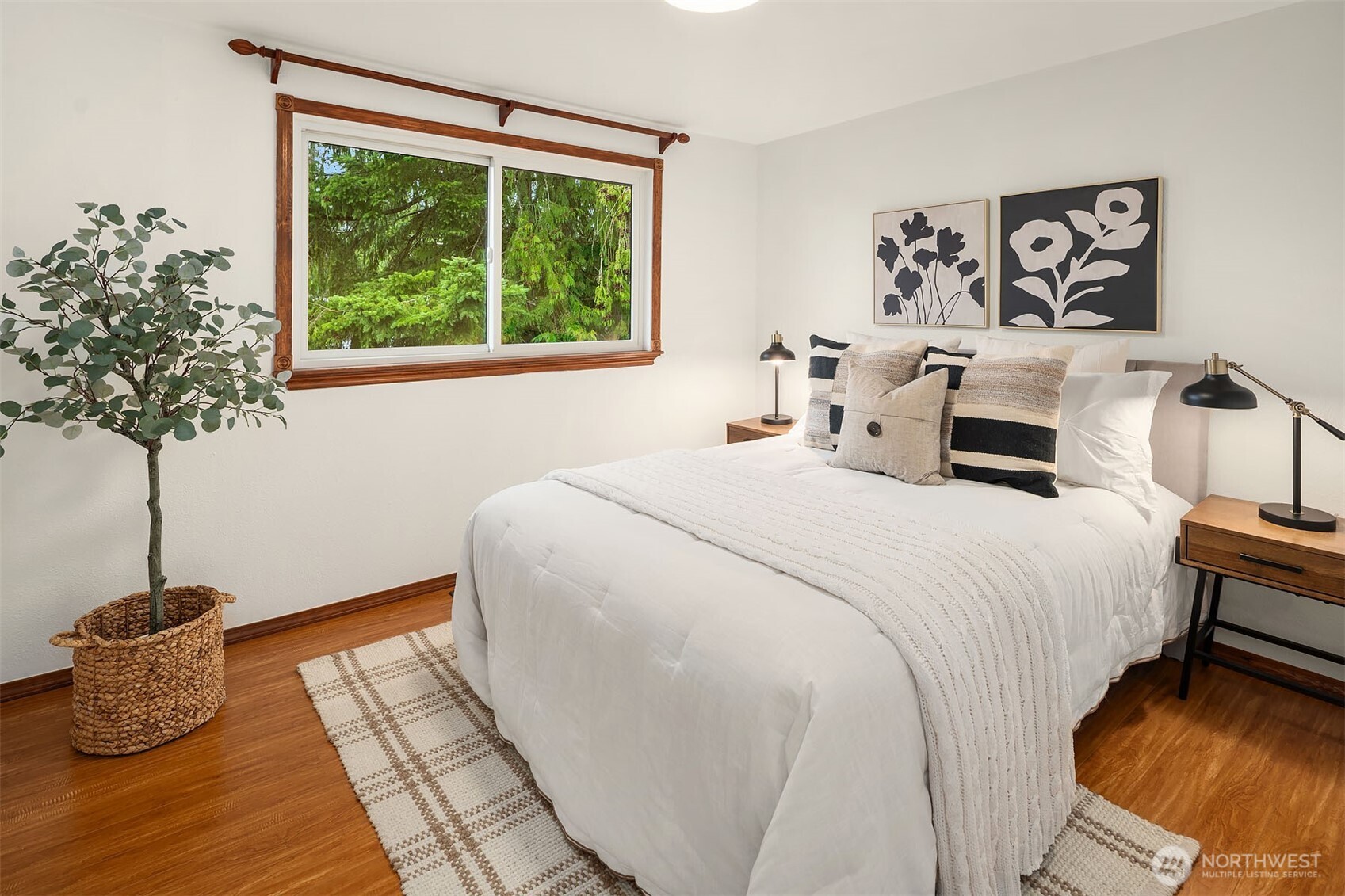 10017 Northeast 202nd Street Bothell, WA 98011 - Photo 16 of 38 a bedroom with a bed and a window