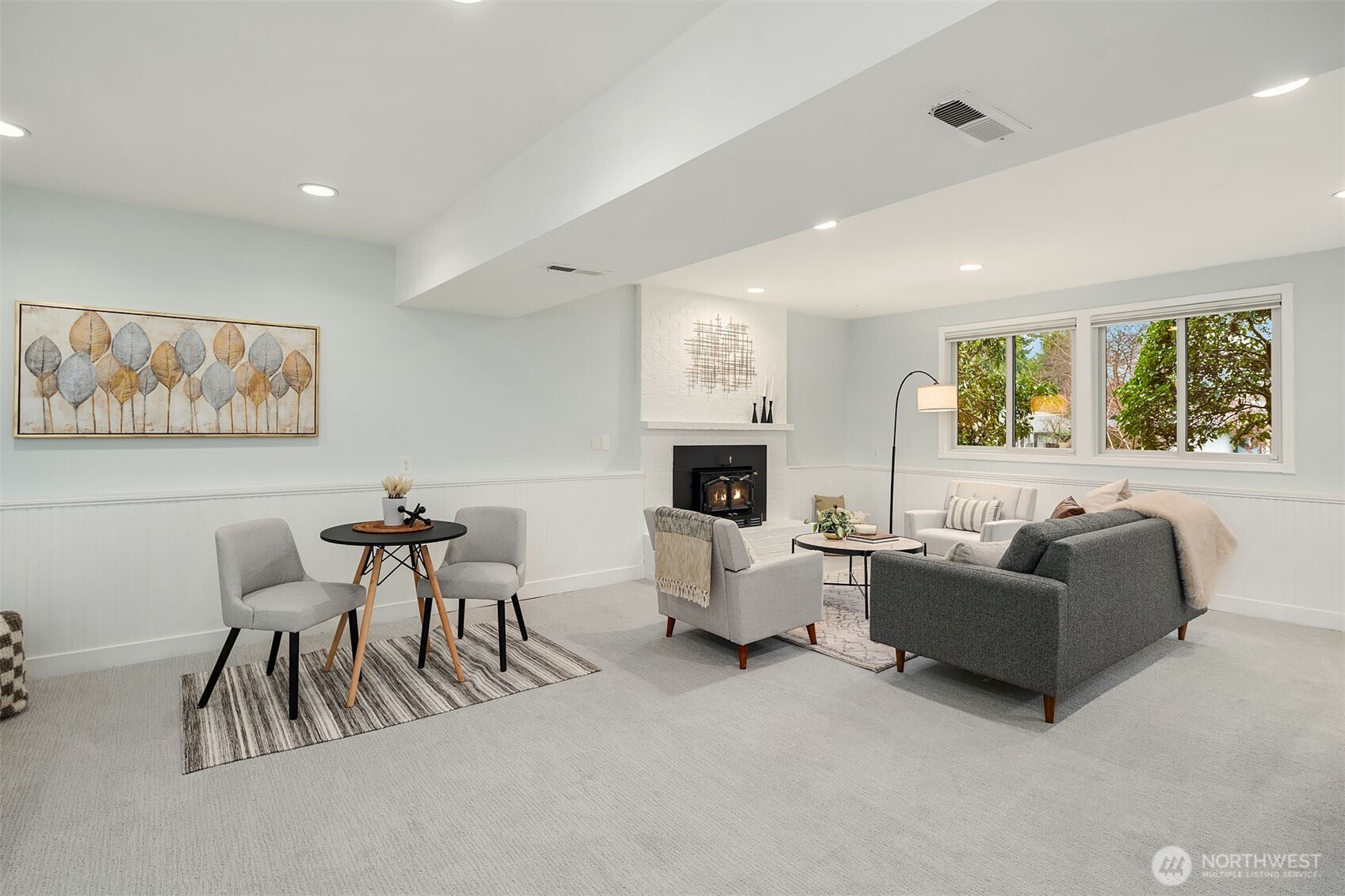 10017 Northeast 202nd Street Bothell, WA 98011 - Photo 23 of 38 a living room with furniture and a large window