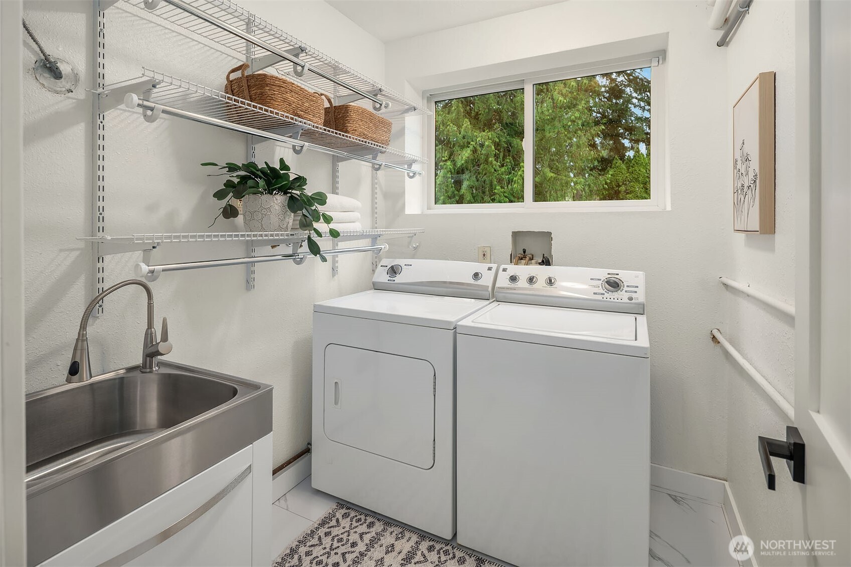 10017 Northeast 202nd Street Bothell, WA 98011 - Photo 28 of 38 a bathroom with a sink and a window