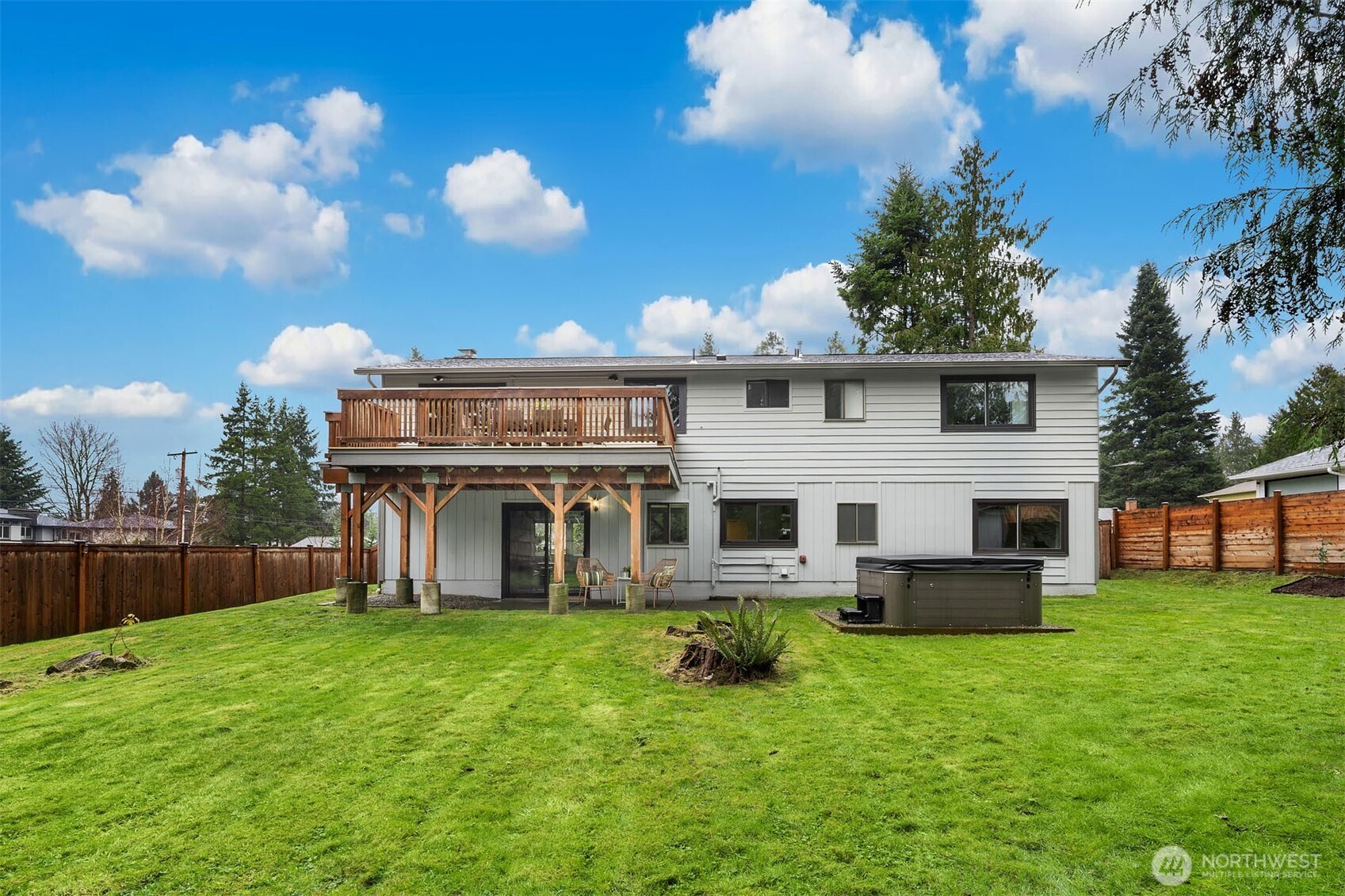 10017 Northeast 202nd Street Bothell, WA 98011 - Photo 31 of 38 a front view of house with yard and outdoor seating