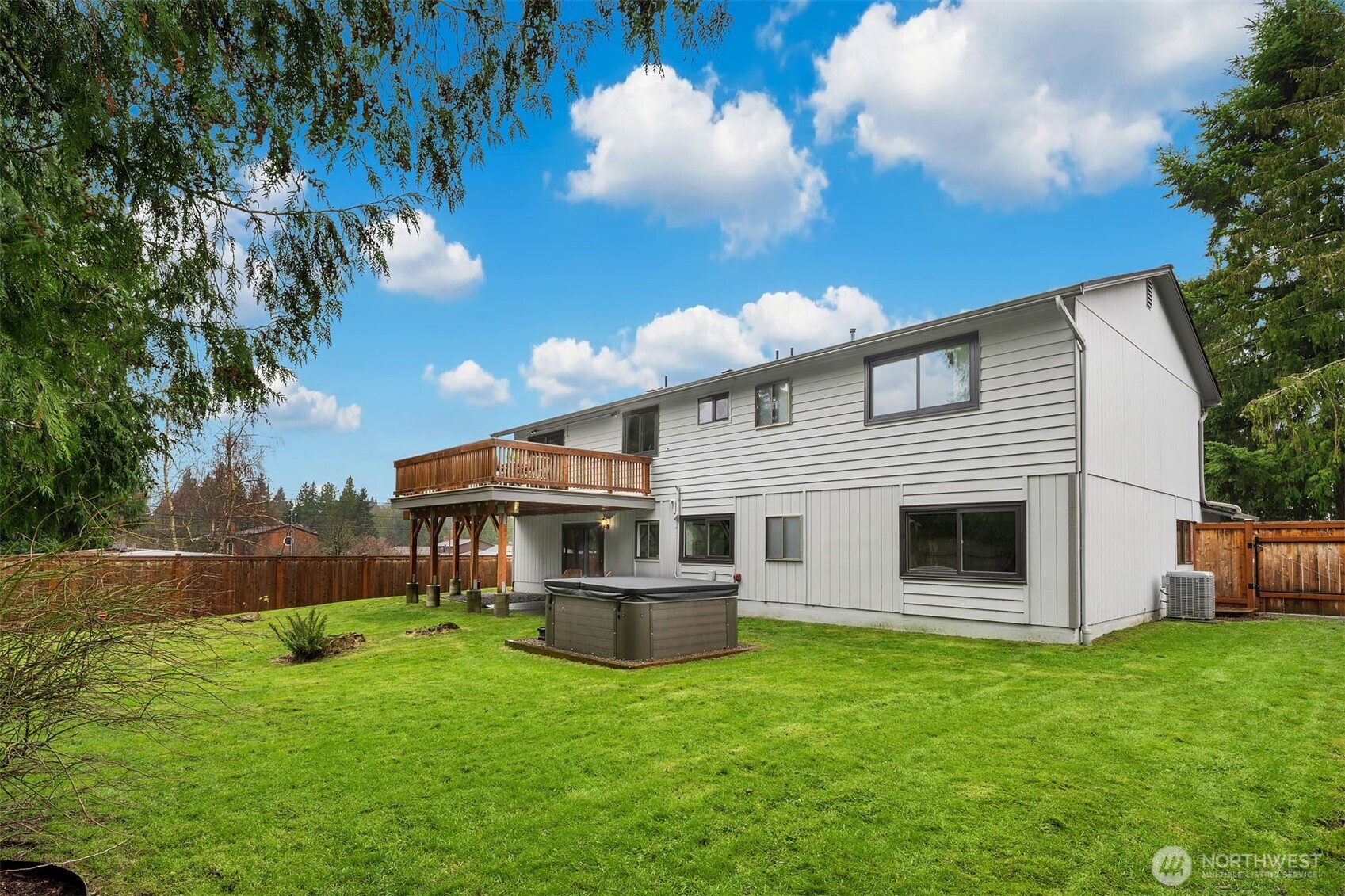 10017 Northeast 202nd Street Bothell, WA 98011 - Photo 32 of 38 a view of house with backyard