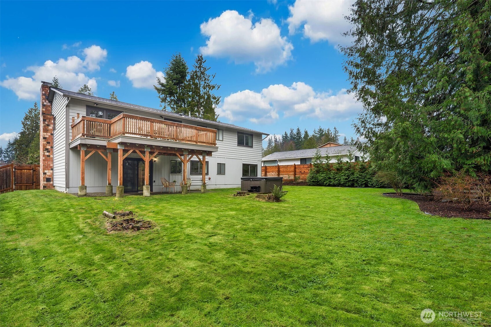10017 Northeast 202nd Street Bothell, WA 98011 - Photo 34 of 38 a view of a house with a big yard