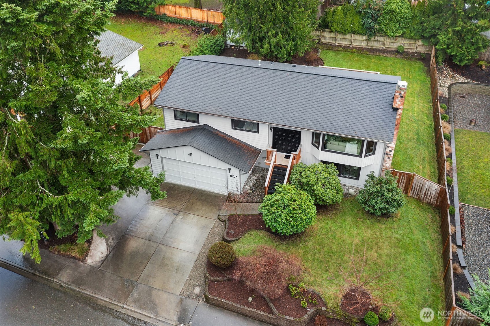 10017 Northeast 202nd Street Bothell, WA 98011 - Photo 37 of 38 an aerial view of a house with a yard