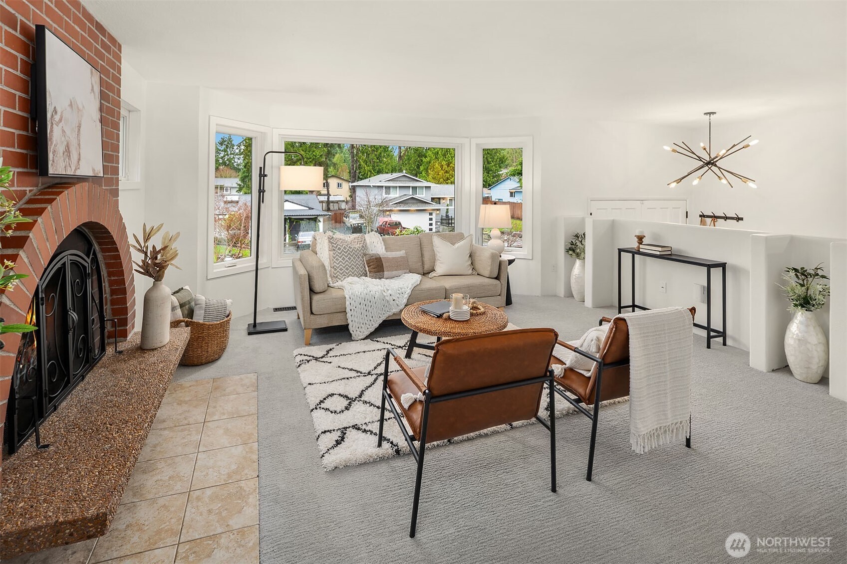 10017 Northeast 202nd Street Bothell, WA 98011 - Photo 5 of 38 a living room with furniture and a floor to ceiling window