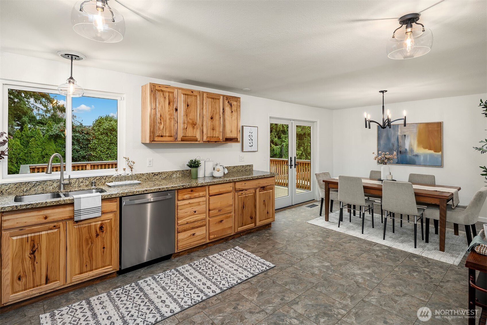 10017 Northeast 202nd Street Bothell, WA 98011 - Photo 10 of 38 a kitchen with sink cabinets and window