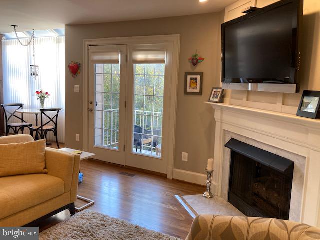7915 Quarry Ridge Way Bethesda, MD 20817 - Photo 11 of 38 Fireplace and balcony doors