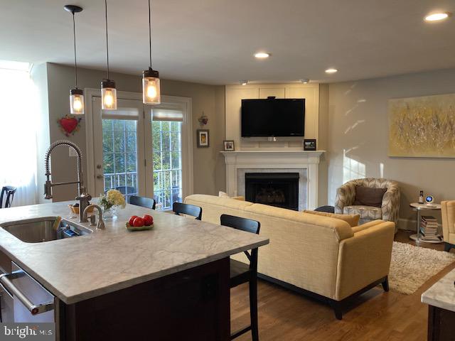 7915 Quarry Ridge Way Bethesda, MD 20817 - Photo 12 of 38 Kitchen and family Room