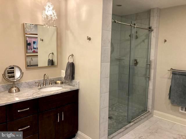 7915 Quarry Ridge Way Bethesda, MD 20817 - Photo 32 of 38 Owner's suite bathroom with walk-in shower