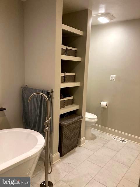 7915 Quarry Ridge Way Bethesda, MD 20817 - Photo 34 of 38 Owners' bathroom linen shelves