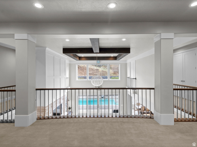 614 East High Lane Alpine, UT 84004 - Photo 59 of 75 Hallway featuring carpet flooring, recessed lighting, a raised ceiling, and coffered ceiling