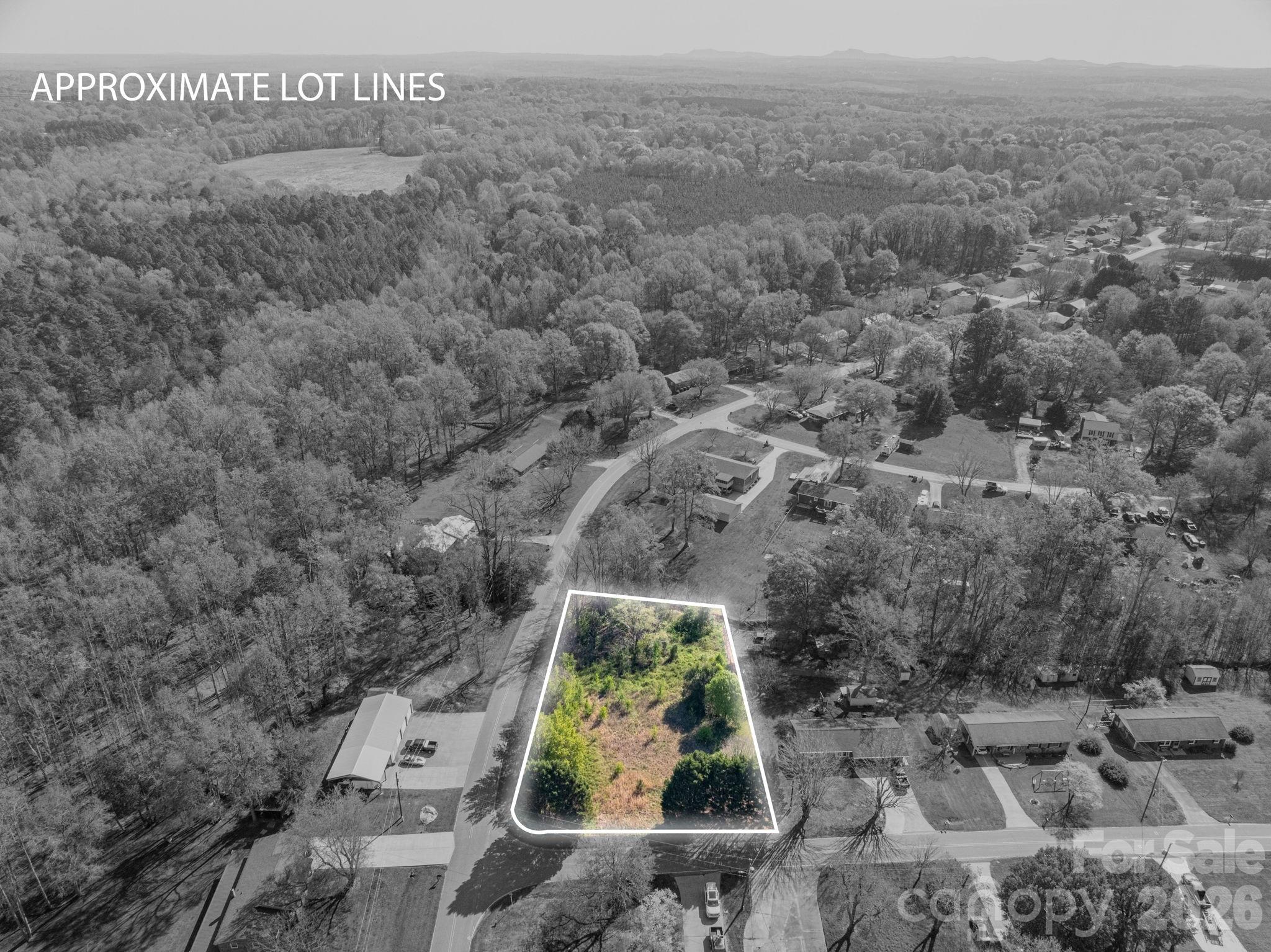 5101 Ridge Street Shelby, NC 28152 - Photo 2 of 21 an aerial view of house with yard and mountain view in back