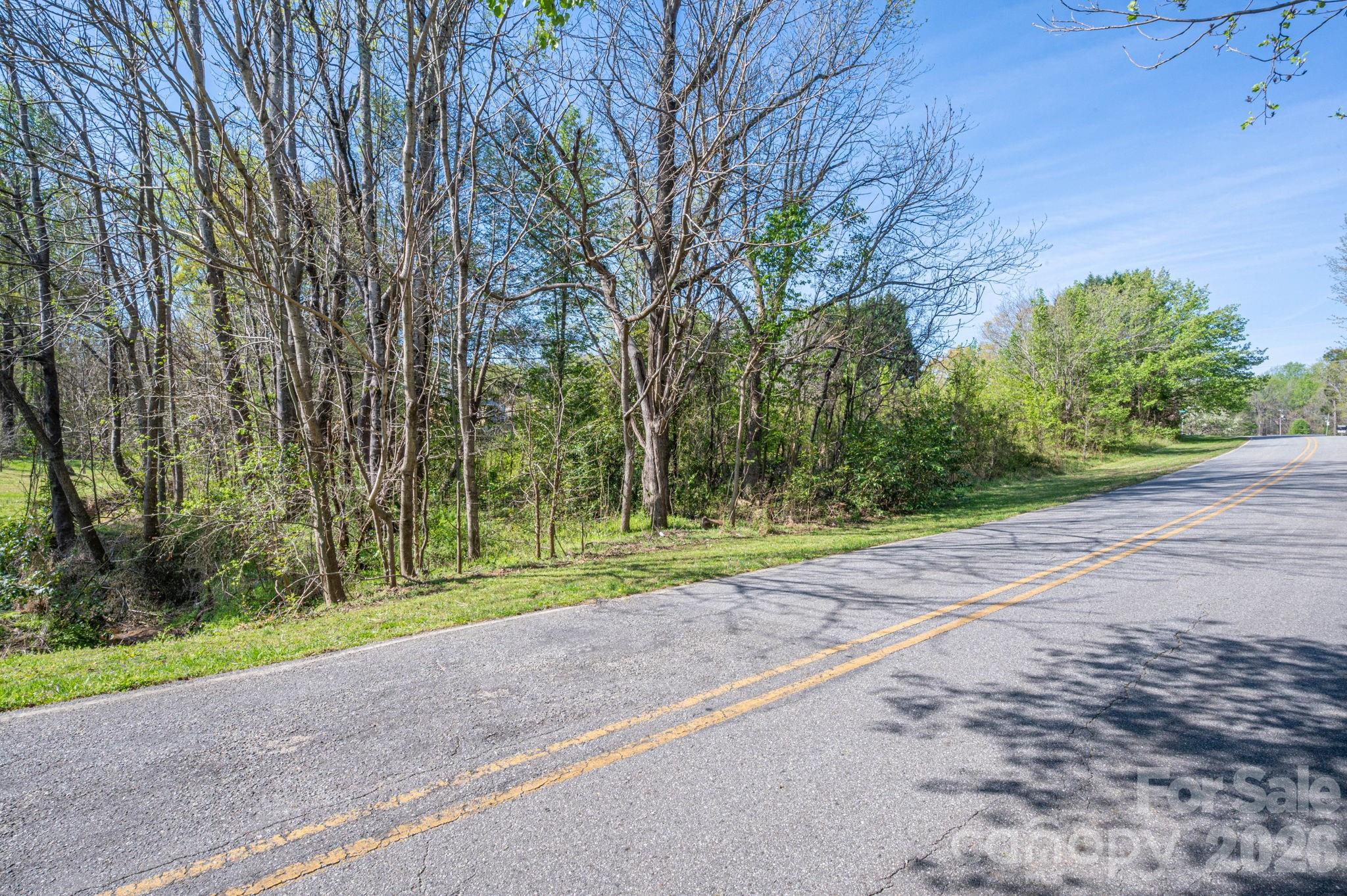 5101 Ridge Street Shelby, NC 28152 - Photo 4 of 21 a view of a road with a trees
