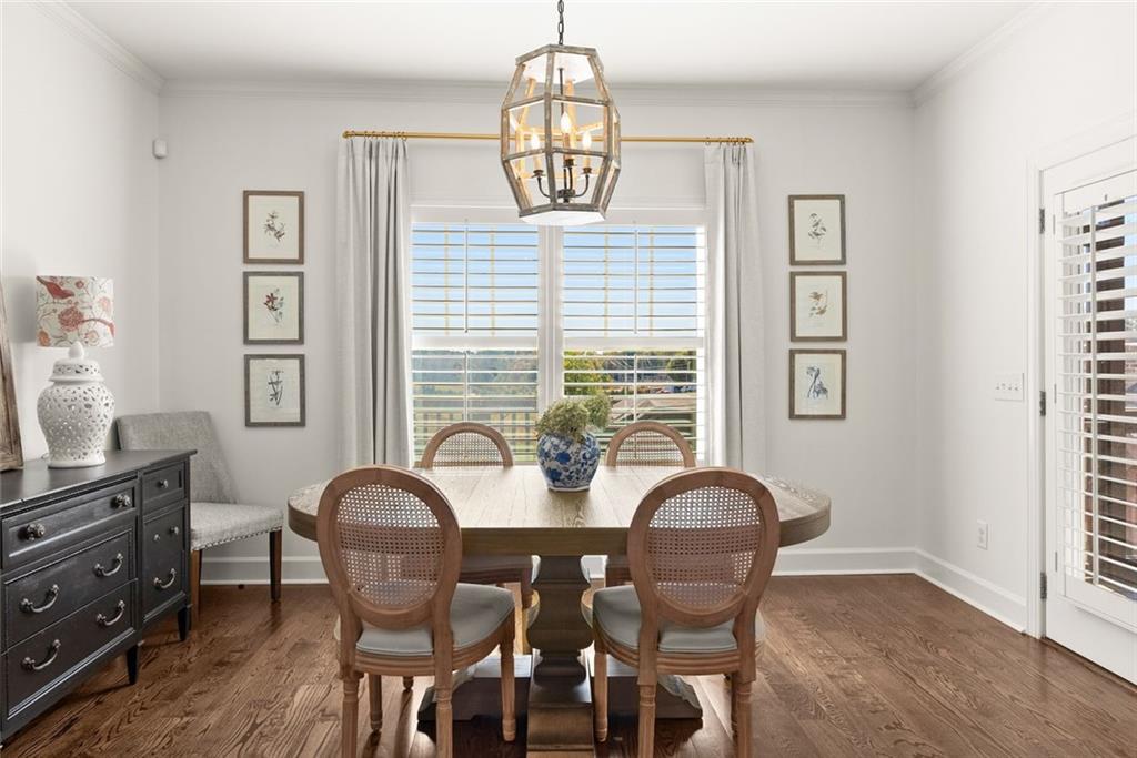 360 Clear View Court Clermont, GA 30527 - Photo 15 of 53 a view of a dining room with furniture and chandelier