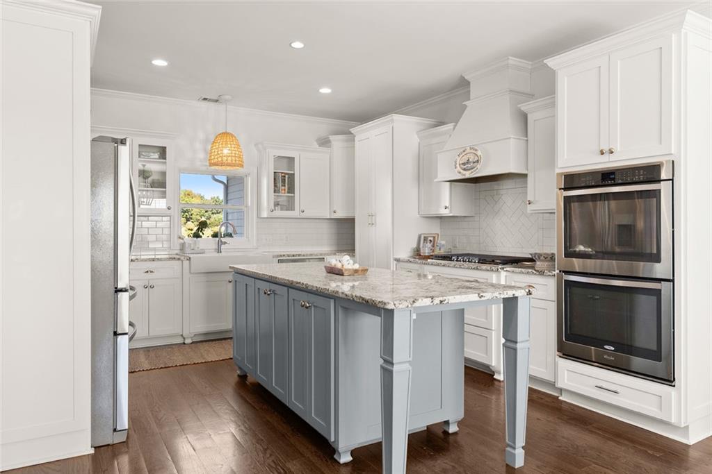 360 Clear View Court Clermont, GA 30527 - Photo 17 of 53 a kitchen with a sink stove and refrigerator