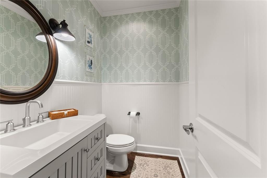 360 Clear View Court Clermont, GA 30527 - Photo 21 of 53 a bathroom with a sink and a mirror