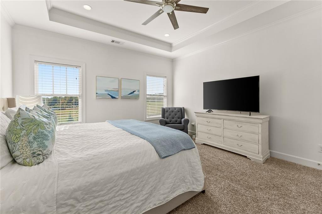 360 Clear View Court Clermont, GA 30527 - Photo 23 of 53 a bedroom with bed tv and window