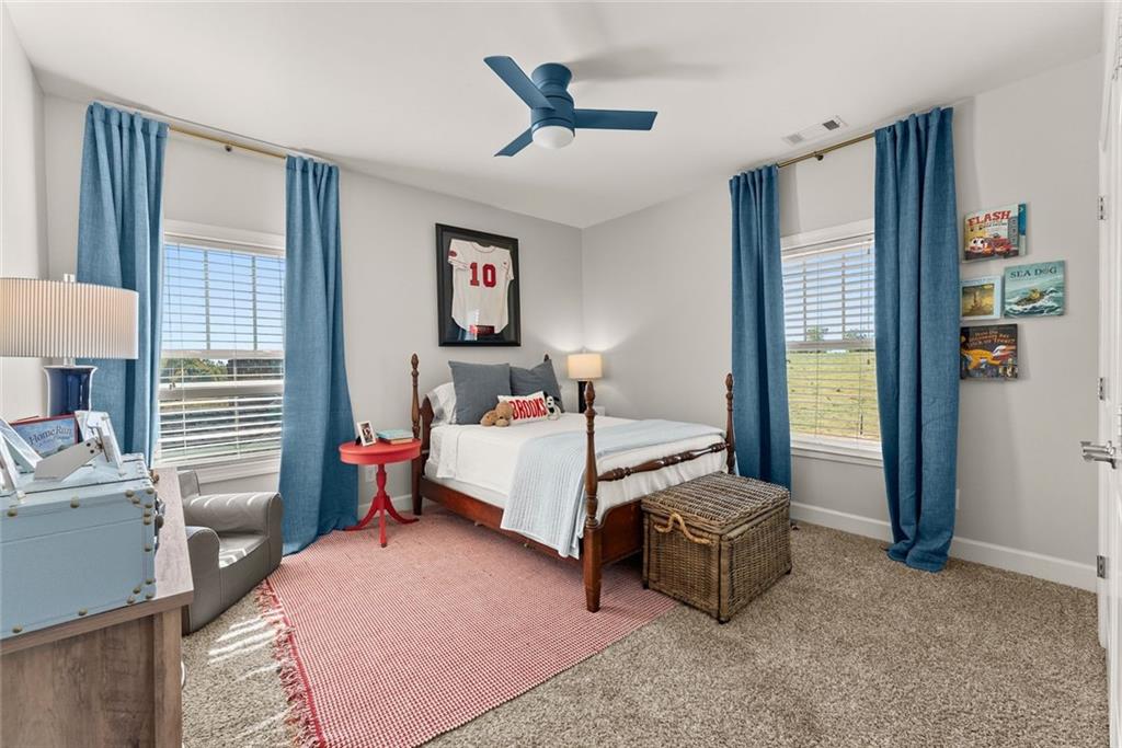 360 Clear View Court Clermont, GA 30527 - Photo 29 of 53 a bedroom with a bed and a window