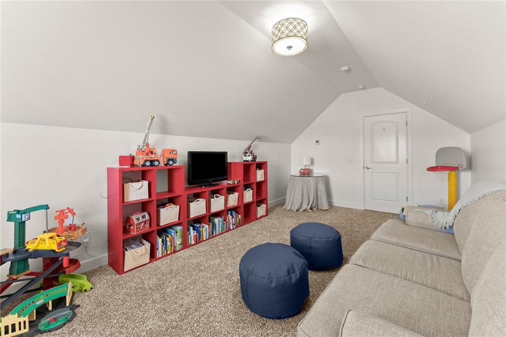 360 Clear View Court Clermont, GA 30527 - Photo 34 of 53 a living room with furniture and a couch