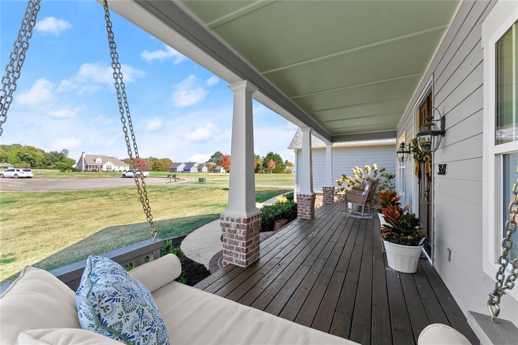 360 Clear View Court Clermont, GA 30527 - Photo 4 of 53 a view of a balcony with lake view and a potted plant
