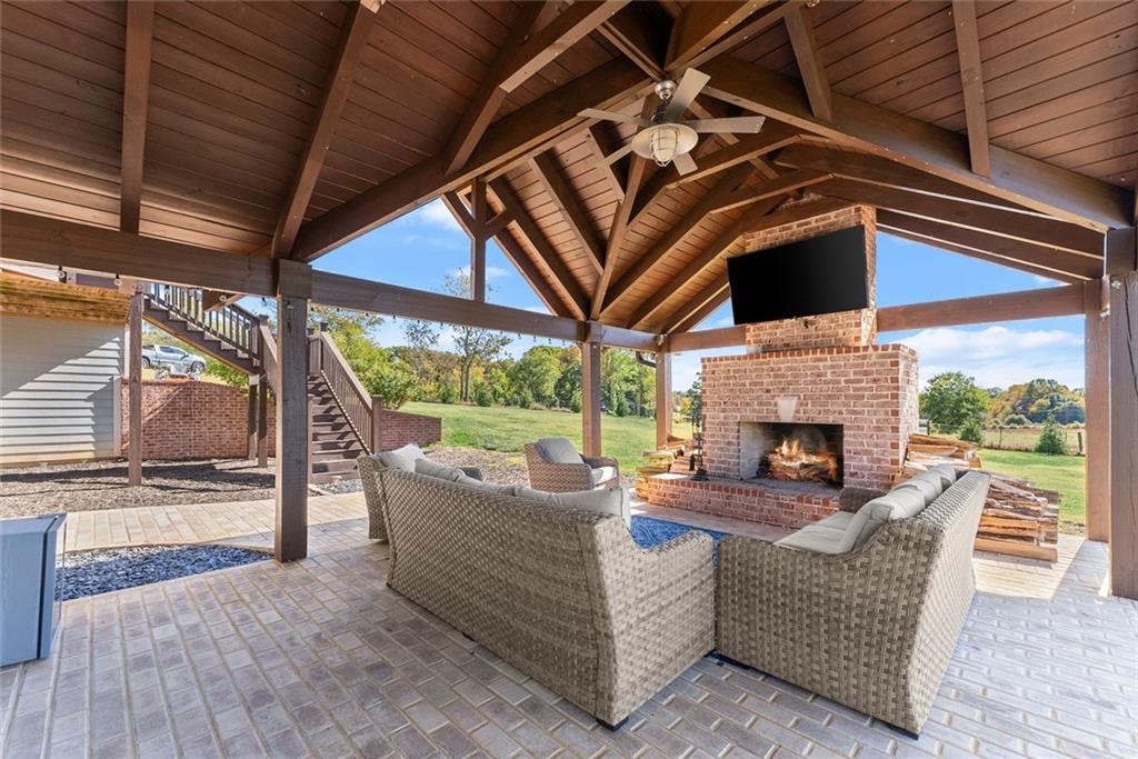 360 Clear View Court Clermont, GA 30527 - Photo 42 of 53 a view of a patio with a table and chairs