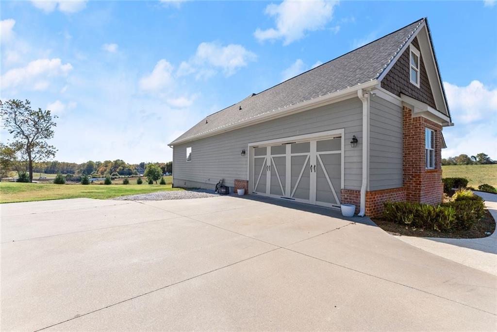 360 Clear View Court Clermont, GA 30527 - Photo 45 of 53 a view of a house with backyard and garden